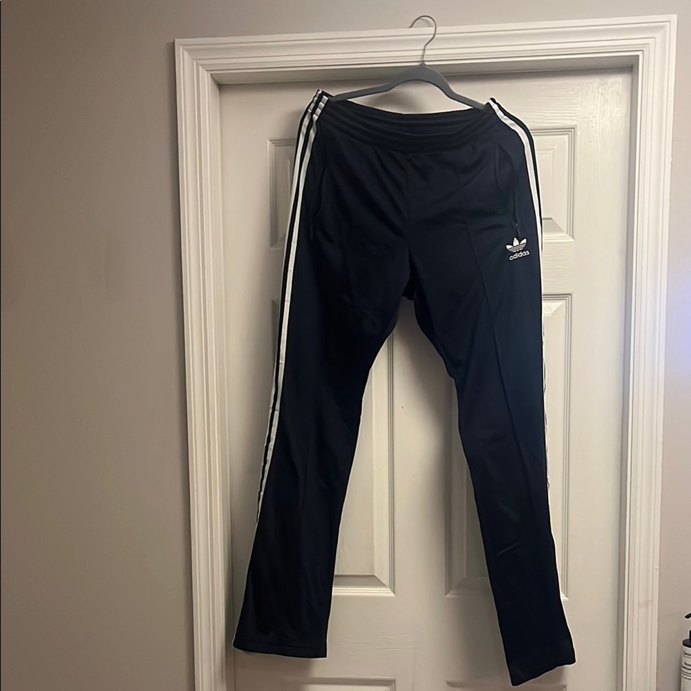 Adidas Blue Track Pants with White Three Stripes
